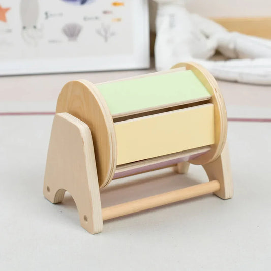 The Montessori Benefits of the Rolling Drum Toy